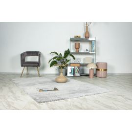 Tapis moderne effet courbe avec franges Hanae