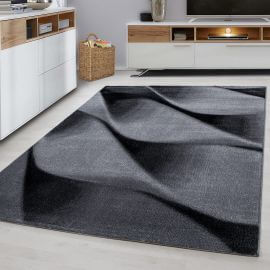 Tapis contemporain effet courbe noir Noghar