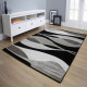 Tapis gris et noir courbe pour salon moderne rectangle Foligno